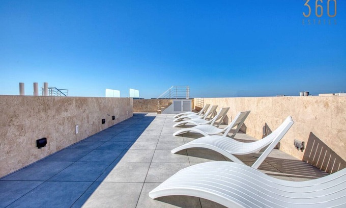 Mellieha Apartment | Beautiful 3BR Apt with Balcony & Roof Pool Access