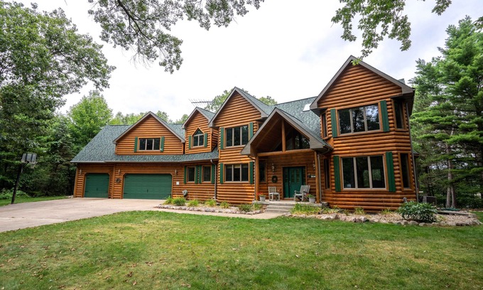 Wild Rose House | Beautiful 8000 Sq. Ft. Log Home With 250 Feet Of Private Frontage on Kusel Lake