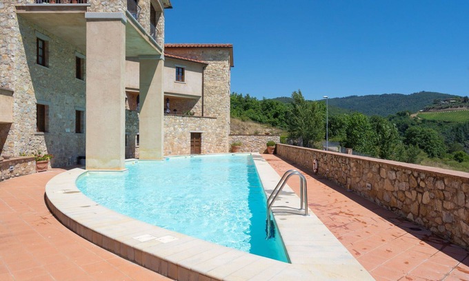 Gaiole in Chianti Apartment | Beautiful apartment with A/C, pool, WIFI, TV, patio, pets allowed, panoramic view and parking