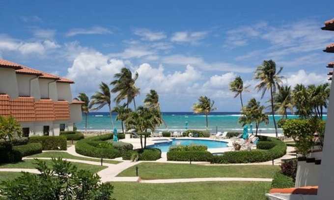 West Bay Condo | Beautiful Beachfront Condo at Villas Pappagallos, Sleeps 3.