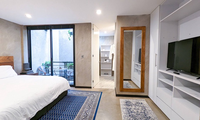 Escandon Apartment | Beautiful Business Condo in the heart of Condesa | Indoor waterfall