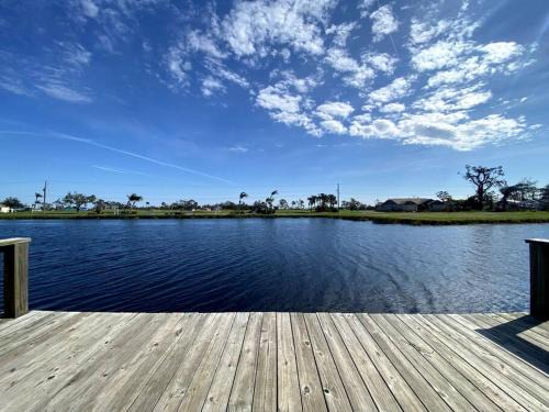 Pebble Beach House | Beautiful Canal & Gulf Waterfront Home