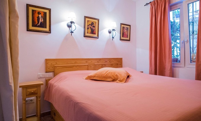 Nerja City Centre Apartment | Beautiful complete apartment with Private Patio & shared Roof Terrace