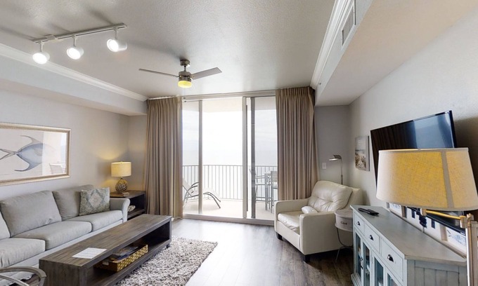 Panama City Beach Condo | Beautiful Condo! Free Beach Chairs Free round of Golf & Activities Every Day!
