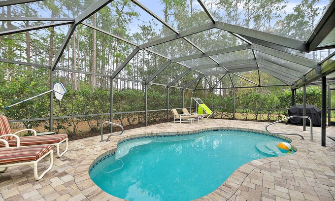 Palm Coast House | Beautiful Heated Pool with Nature Views on Corner Lot- Short Drive to Beaches