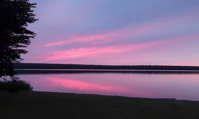 Skanee Cottage | Beautiful Huron Bay sunsets from your own private beach.
