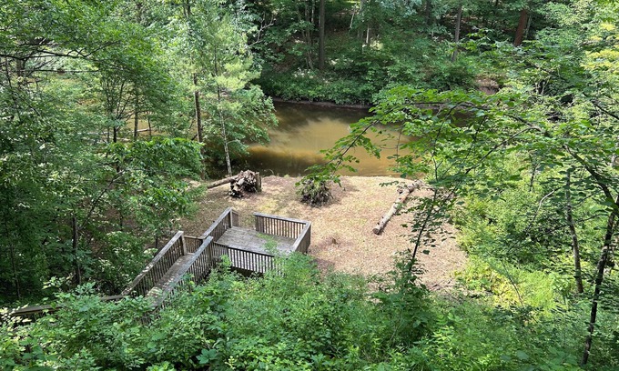 Muskegon House | Beautiful private getaway in updated Cape Cod style home on the river.