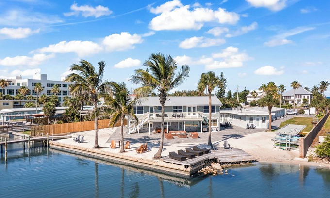 Orlando Beach Condo | Beautiful Riverfront Villa W/Private Beach Access, Fire Pit, & BBQ Grills
