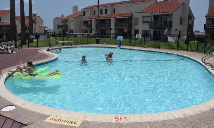 Rockport Condo | Beautiful waterfront condo on Aransas Bay. Pool. Lighted Pier. Tennis. Boat Slip