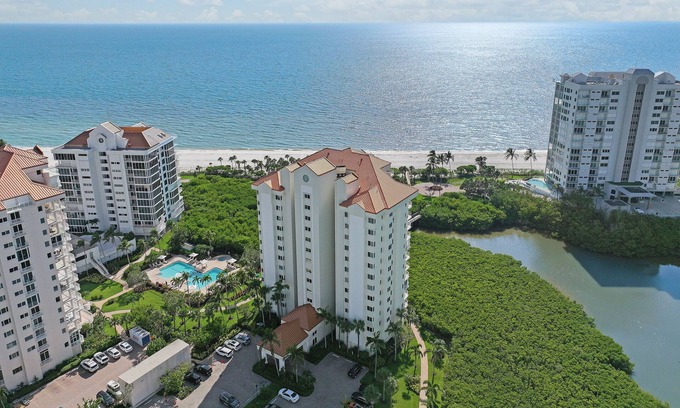 Park Shore Condo | Beautifully updated 3 bed 2 bath beachfront condo with Gulf views