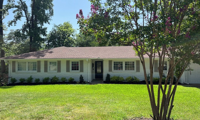 Tyler House | Beautifully updated 3bedroom 2 bath home with a large glassed in sunroom.