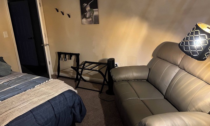 Gainesville Condo | Bedroom within 3BR condo - dog friendly