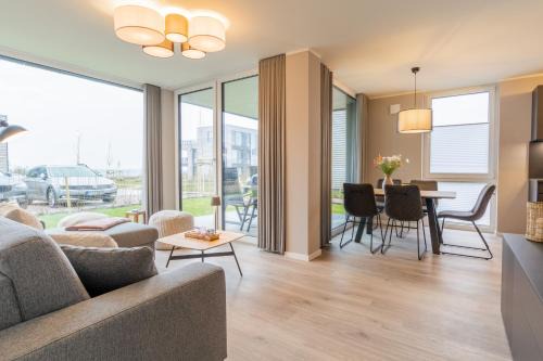 Marienleuchte Apartment | BeltBlick 20 - Moderne Ferienwohnung direkt an der Ostsee mit Meerblick & Sauna!