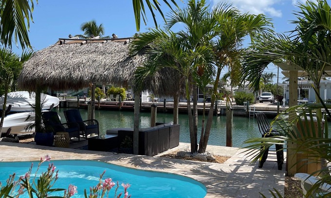 Key Colony Beach House | Best 2/2 in KCB. Private Pool/Private Dock/Lush backyard/Tiki & Outdoor Bar.