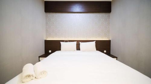Surabaya Apartment | Best Choice and Cozy Living 2BR at Bale Hinggil Apartment By Travelio