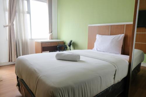 Cileunyi Apartment | Best Deal Studio at Harvard Jatinangor Apartment By Travelio