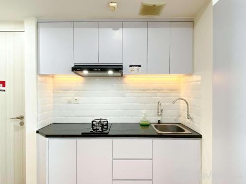 Pekayon Jaya Apartment | Best Modern Studio at Grand Kamala Lagoon Apartment By Travelio
