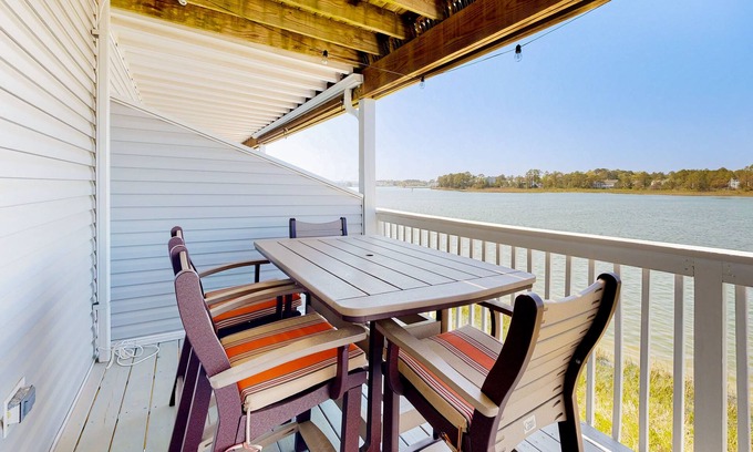 Ocean View Condo | Bethany Marina bayfront condo with pool, 4 bikes, fireplace, water views