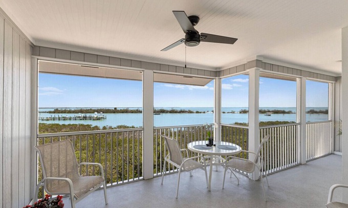 Boca Grande House | BG Grande 34 - 2 Bed/2 Bath Top Floor - Bayfront - Watch the Sunrise with Coffee!