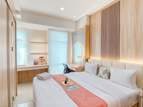 Cikarang Apartment | Big and Comfy Studio at Vasanta Innopark Apartment By Travelio