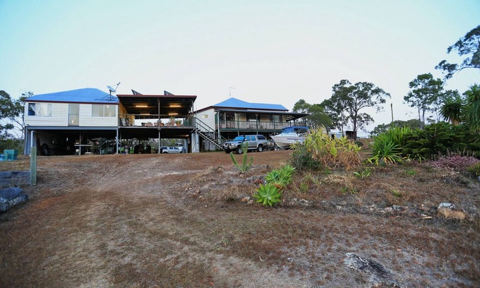 Rodds Bay House | Big inviting Queenslander overlooking the bay with sea breezes and water views