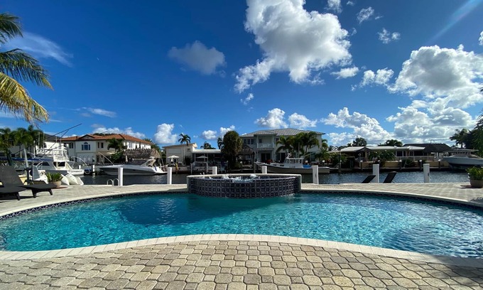 The Cove House | Blissful, serene waterfront Deerfield Beach retreat. Close to the beach.