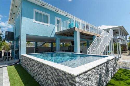 Marathon House | Blue Bungalow New Listing Canal Front Dock Pool