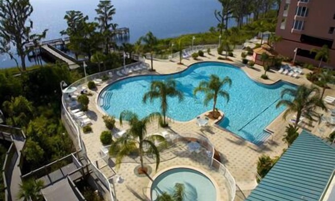 Florida Central Atlantic Coast Condo | BLUE HERON LAKEFRONT 2 BED 2 BATH CONDO -1 MILE TO DISNEY- SLEEPS 6 -WIFI