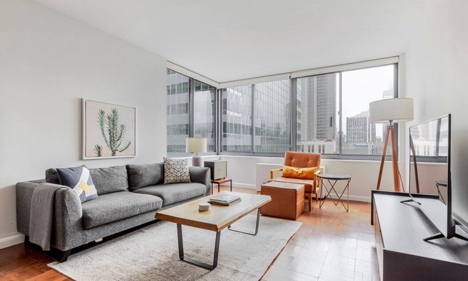 Central New York City Apartment | Blueground | Theater District, gym & AC, nr Times Sq