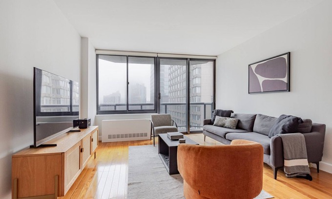 Central New York City Apartment | Blueground | Theater District, gym, nr Times Sq