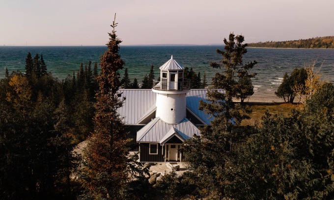 Straits of Mackinac House | Bois Blanc Island Lighthouse Home. Iconic Sunset Views of the Mackinac Bridge!