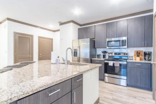 Middletown Apartment | Boulevard Stays Charming 2BR Retreat Pool Parking Gym