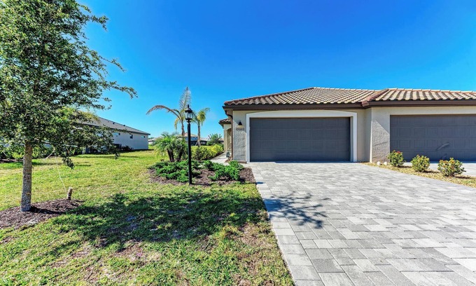 Lakewood Ranch Villa | BRAND NEW 2-bed/2-bath villa in Lorraine Lakes w/expanded lanai. 3 beds w/den!