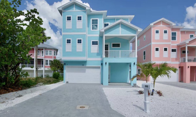 Fort Myers Beach House | Brand new custom home STEPS from the beach and times square - Unbelievable bay views, stunning pool and spa and large entertaining space!