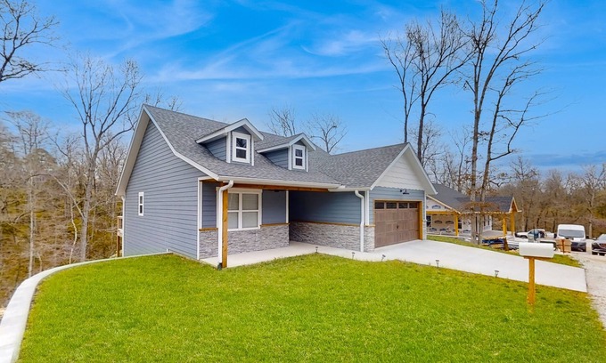 Anderson House | Brand-new, dog-friendly home among the treetops with great deck & location