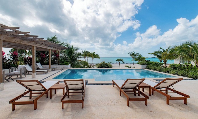 South Palmetto Point House | Brand New Estate with Pool & Private Backyard Beach on Calm Caribbean