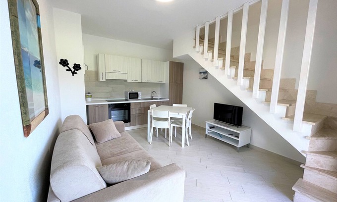 Viddalba Apartment | Brand new two-story apartment in residence with pool, equipped with washing machine