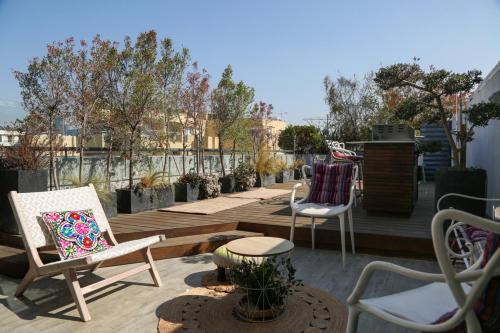 Florentin Apartment | Breathtaking Duplex Penthouse near Rothschild BLVD