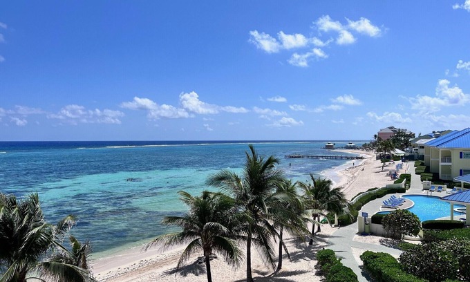 Colliers Bay Condo | Breathtaking Ocean View Beachfront Top Floor Condo