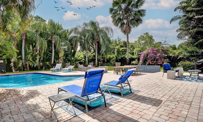 South Middle River House | Breathtaking Pool Home and Backyard by Wilton Mnrs