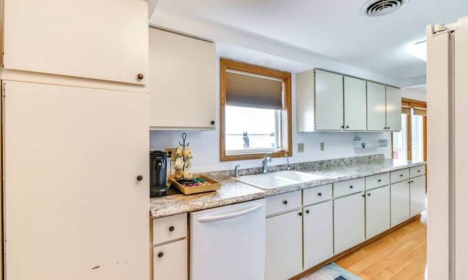 Alpena Cottage | Breathtaking Sunsets: Lake Huron Beachfront Escape
