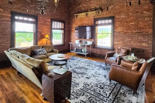 Brevard Apartment | Brick Loft Penthouse on Main
