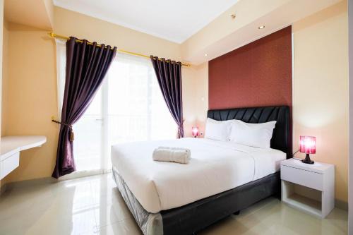Cikarang Apartment | Bright and Stylish 1BR The Oasis Apartment Cikarang By Travelio