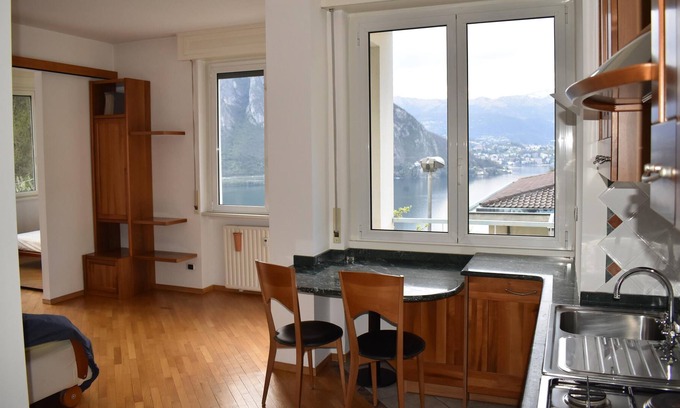 Campione d'Italia Apartment | Bright Apartment with Lake View & Balcony