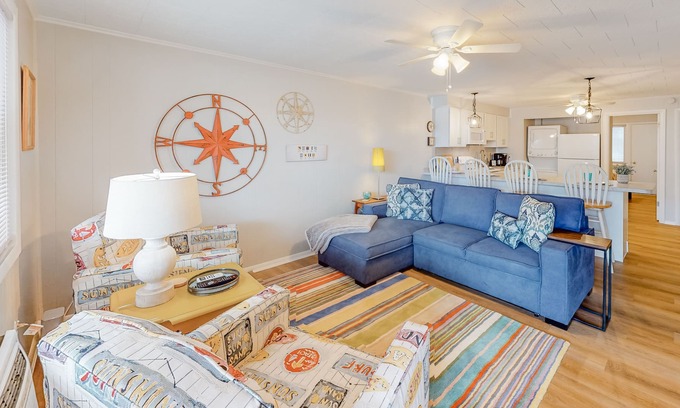 North Ocean City Condo | Bright condo feet from the sand with furnished patio, fast WiFi & ideal location