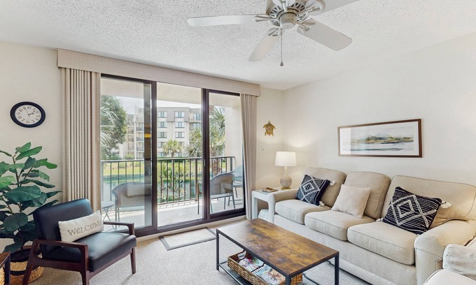 Folly Field Condo | Bright Condo with Full Kitchen, Shared Pools, Hot Tub, Beach Access, and More