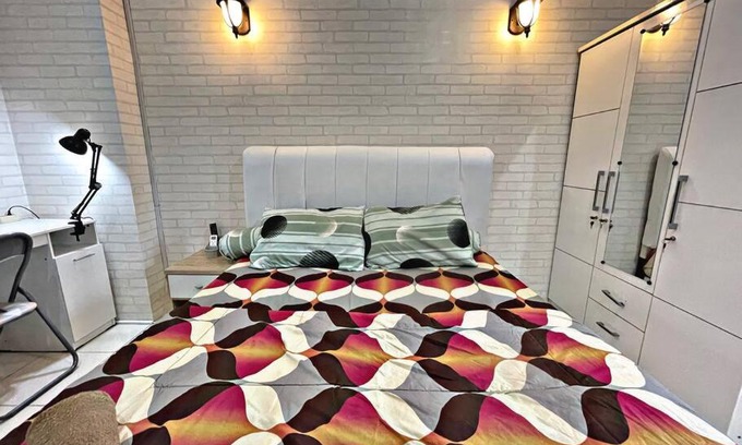 Pluit Apartment | Bright cozy studio 1BR Cityview, SmartTV,FAST Wifi at Greenbay Pluit