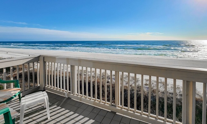 Sunnyside House | Bright Gulf-front condo with two balconies, pool, central AC, & W/D