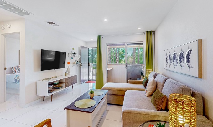 Racquet Club West Condo | Bright & modern dog-friendly oasis with pool, tennis courts, balcony, & A/C