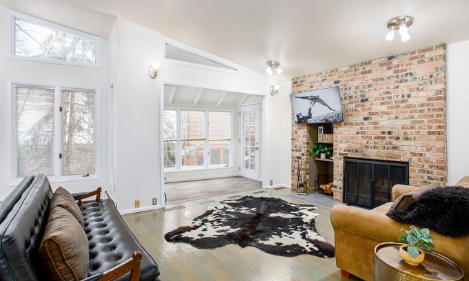 Northeast Anchorage House | Bright modern home with private hot tub, fireplace, enclosed yard, & WiFi
